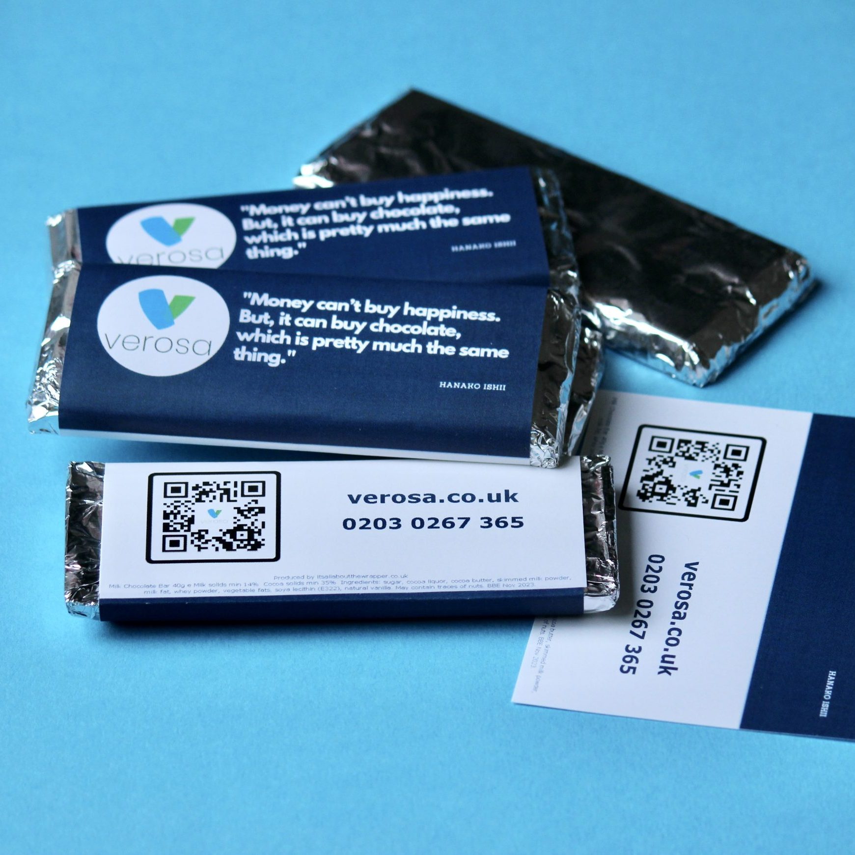 Branded chocolate bars with a QR code on the wrapper